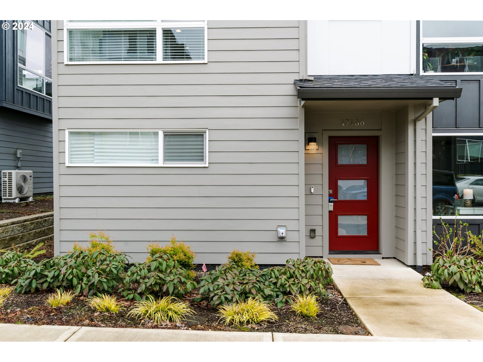 17136 Southwest Woodpecker Lane Beaverton, OR 97007 - Photo 4 of 34 a view of a entryway door front of house