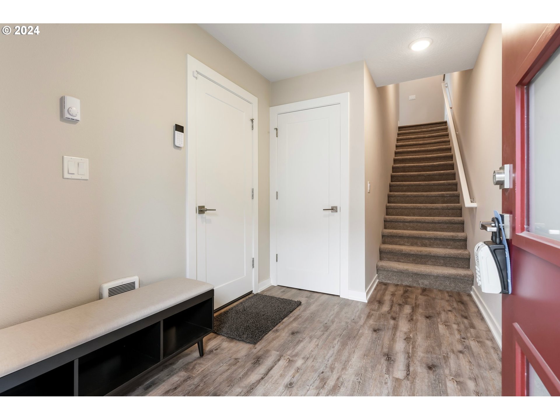 17136 Southwest Woodpecker Lane Beaverton, OR 97007 - Photo 5 of 34 a view of room with stairs and wooden floor