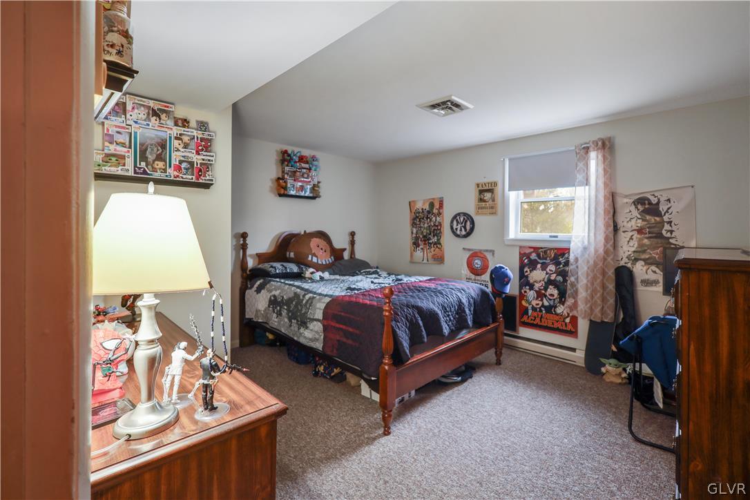 4585 Maple Drive Walnutport, PA 18088 - Photo 21 of 36 a bedroom with bed and a closet