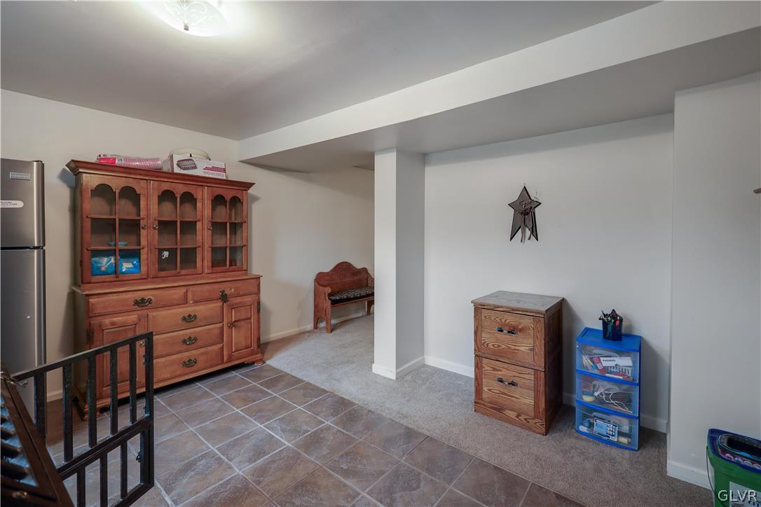 4585 Maple Drive Walnutport, PA 18088 - Photo 26 of 36 a room with furniture a washer and dryer