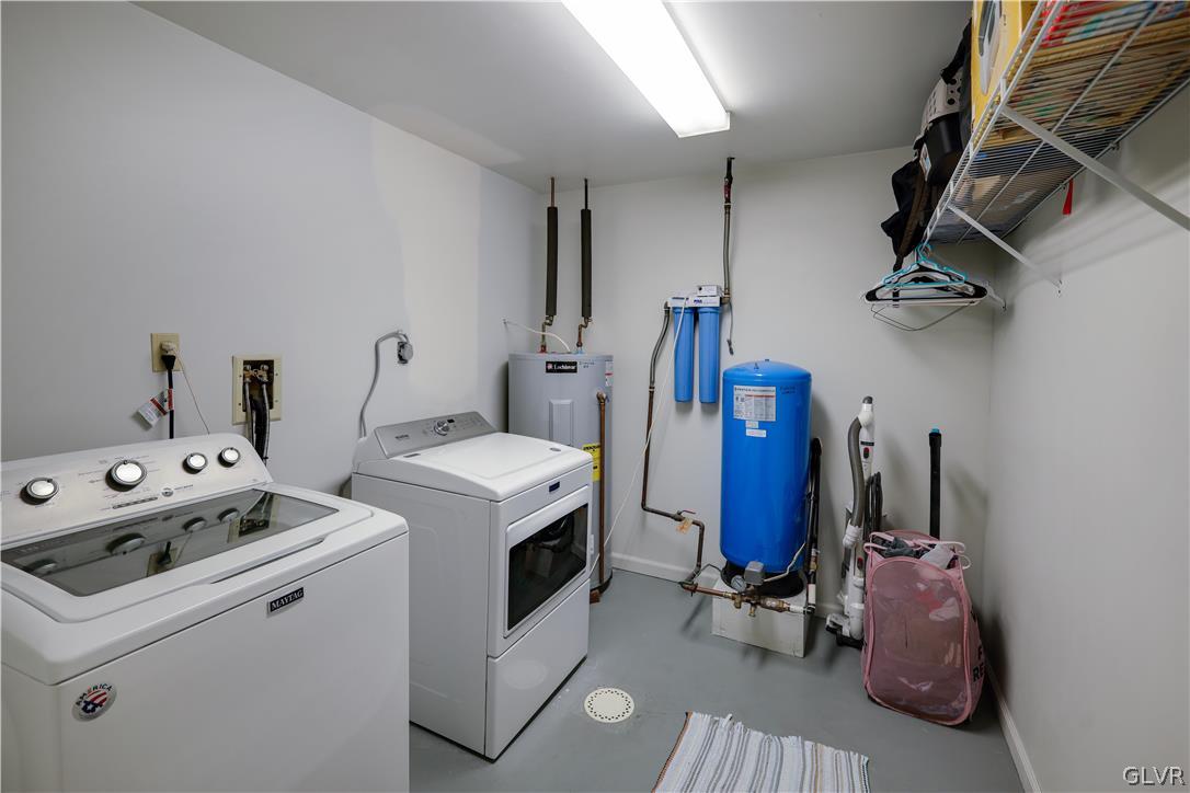 4585 Maple Drive Walnutport, PA 18088 - Photo 27 of 36 a view of storage and utility room with washer and dryer