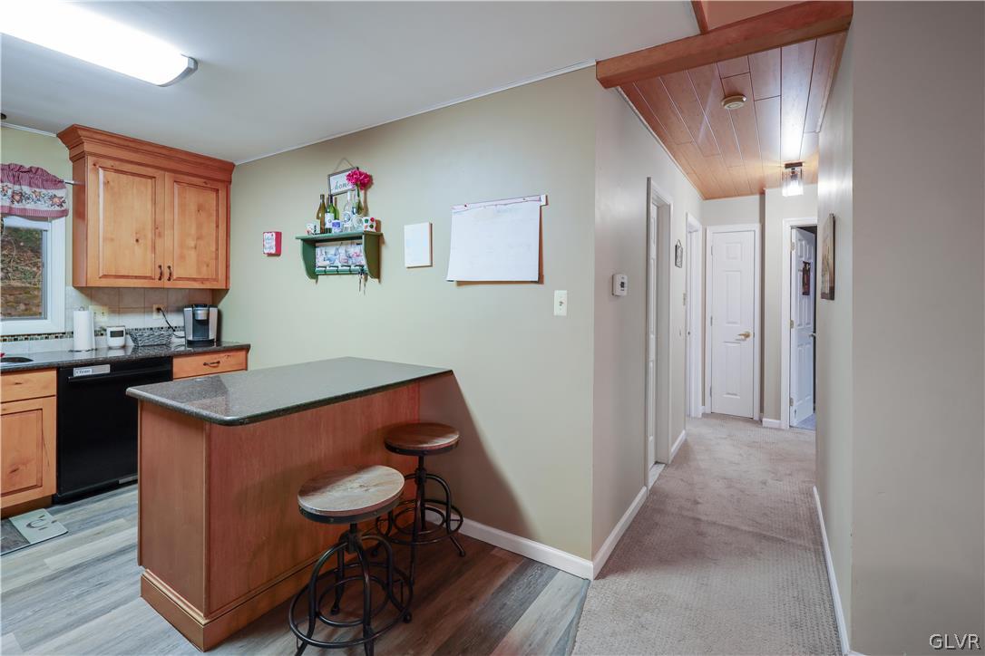 4585 Maple Drive Walnutport, PA 18088 - Photo 6 of 36 a view of kitchen cabinets and wooden floor