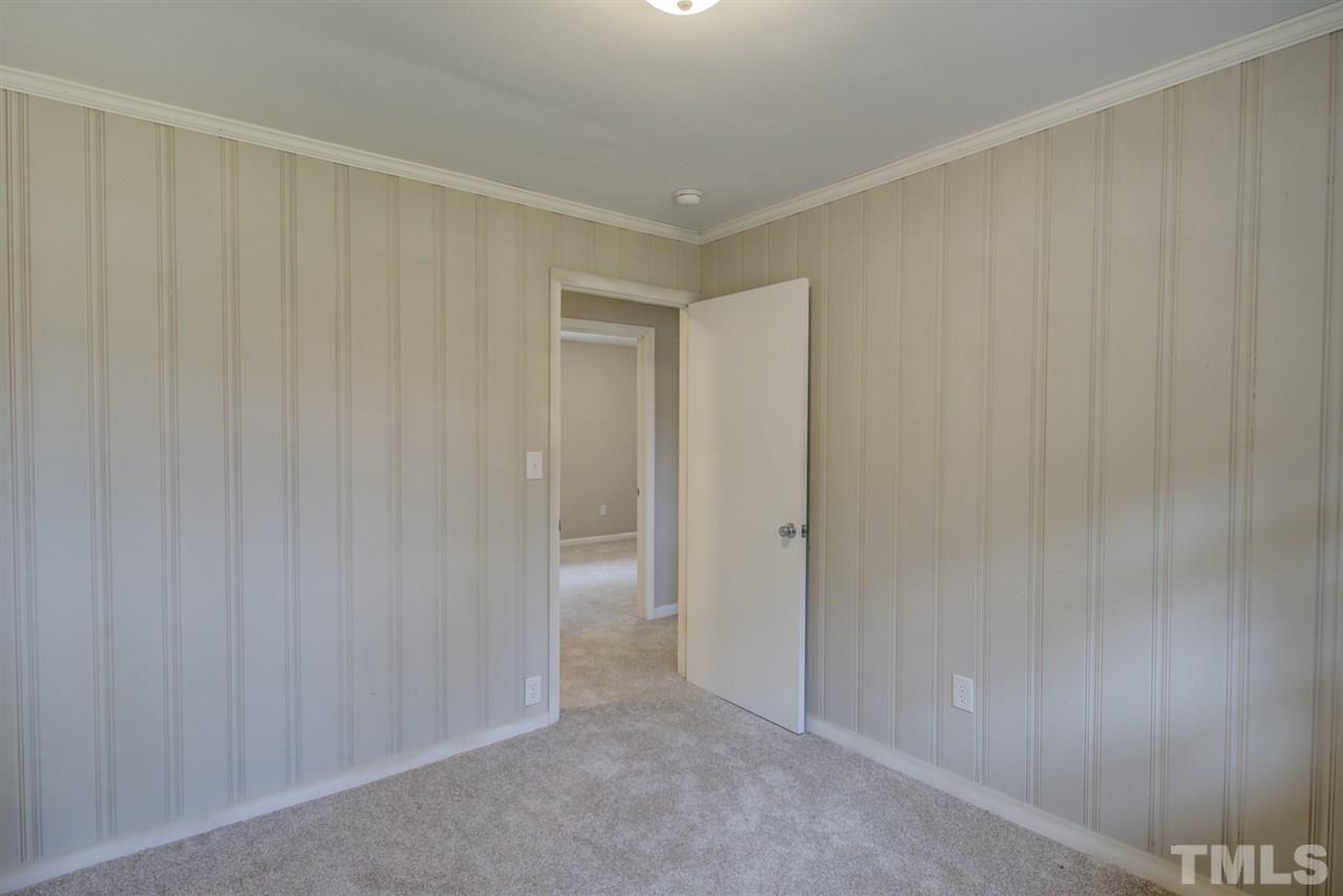 309 Creech Road Garner, NC 27529 - Photo 22 of 30 a view of an empty room