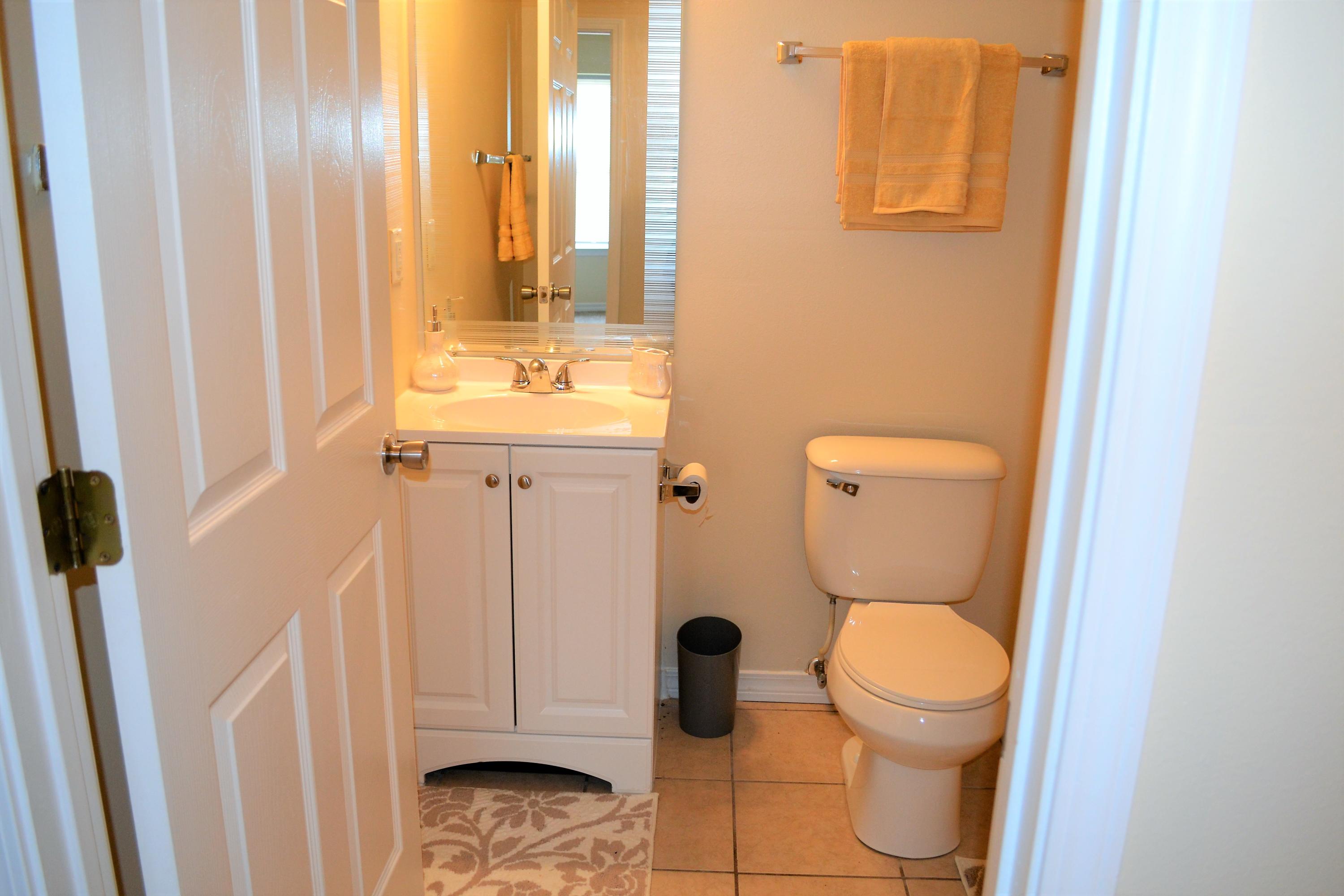 5237 Kervin Road Crestview, FL 32539 - Photo 15 of 28 a bathroom with a toilet sink and tub