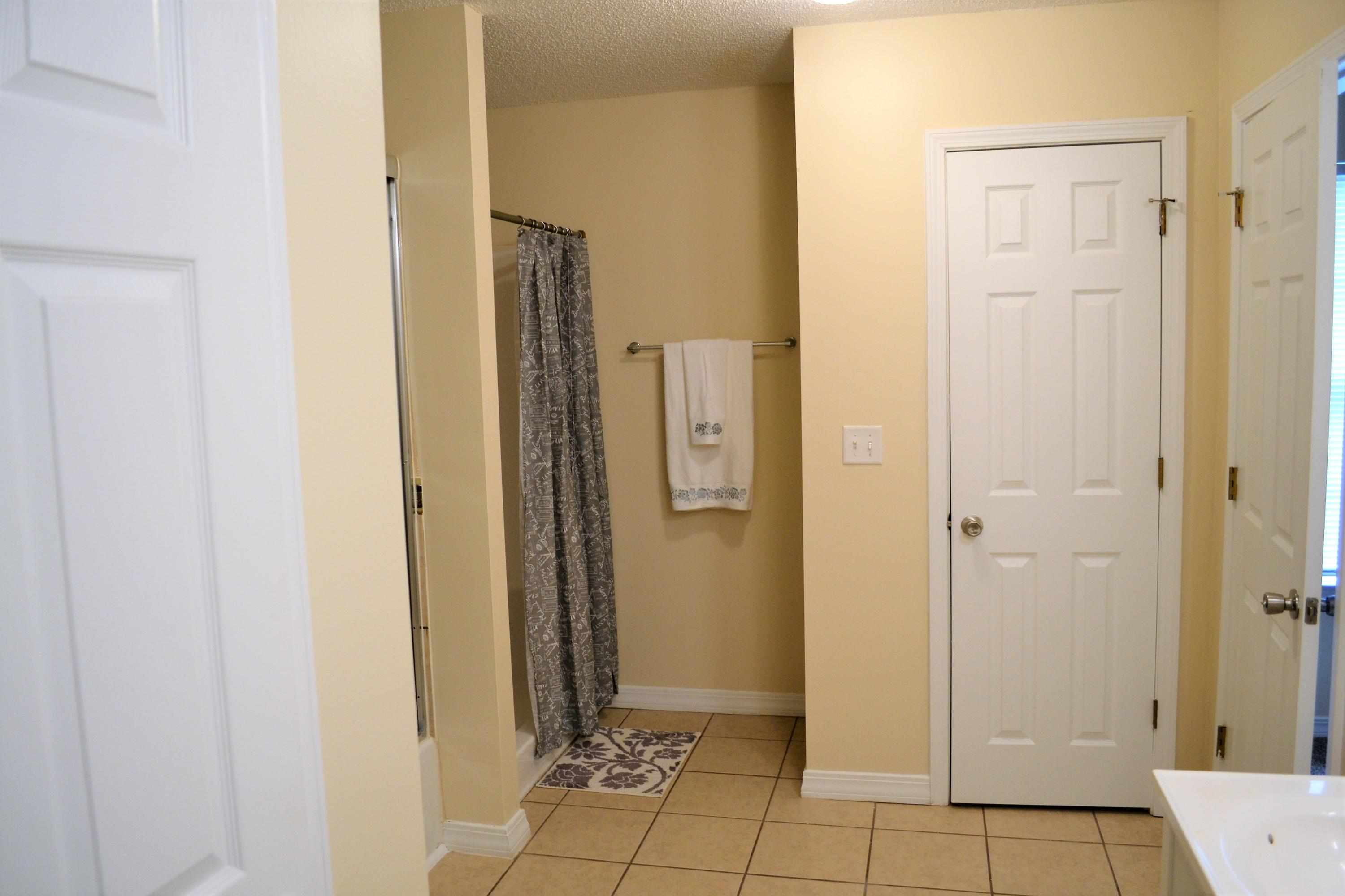 5237 Kervin Road Crestview, FL 32539 - Photo 21 of 28 a view of a bathroom with a shower