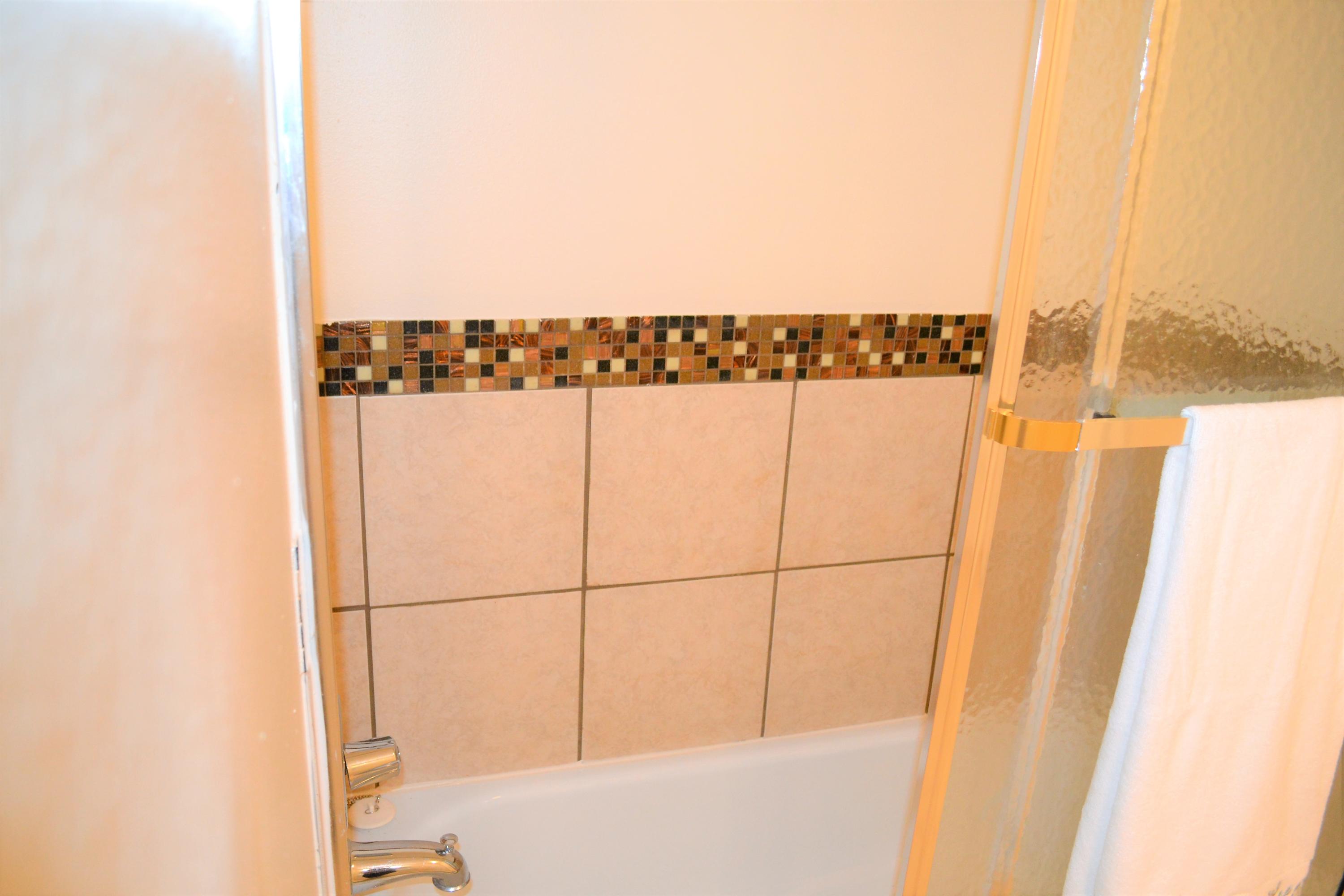 5237 Kervin Road Crestview, FL 32539 - Photo 22 of 28 a bathroom with a shower