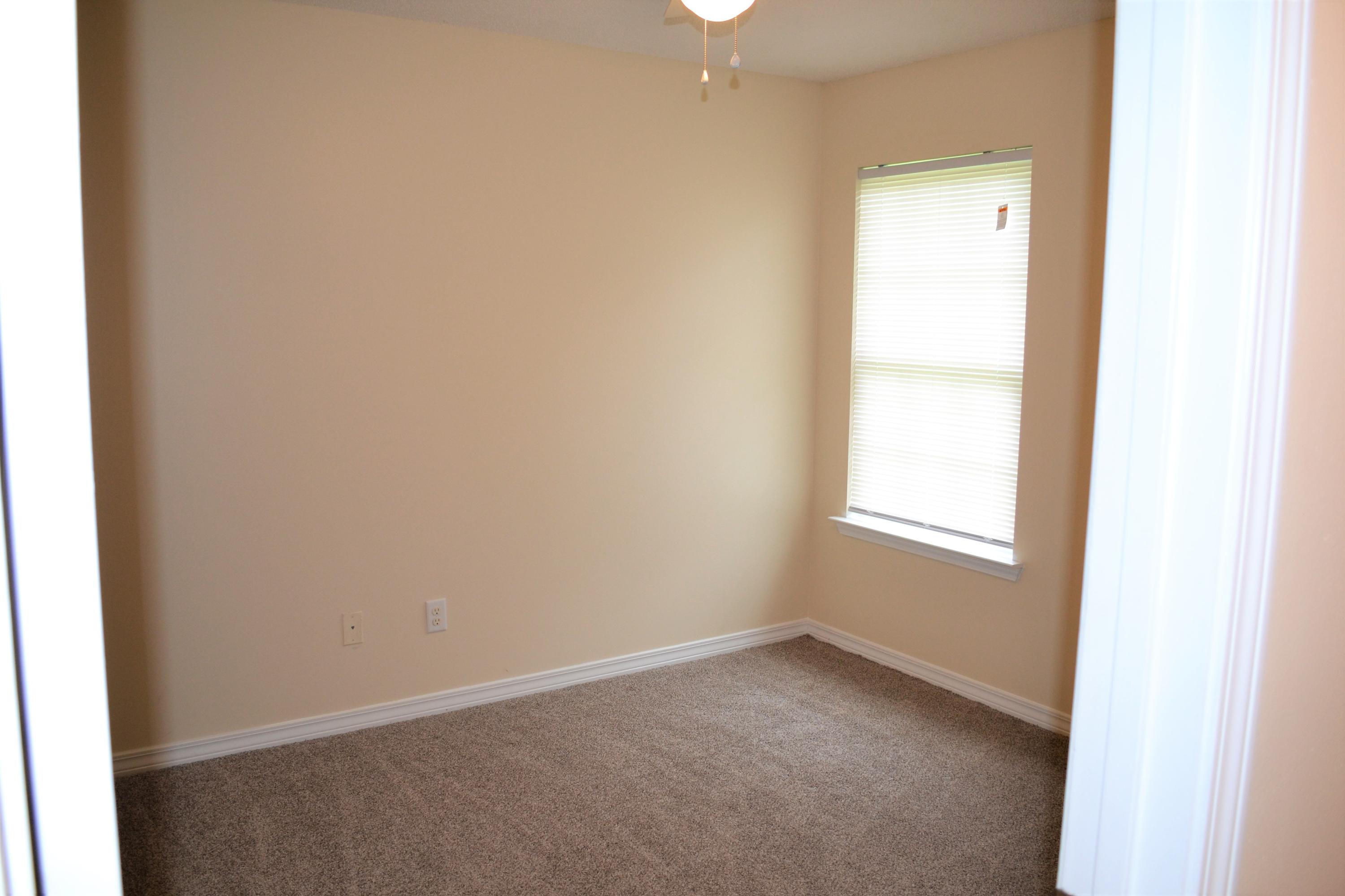 5237 Kervin Road Crestview, FL 32539 - Photo 24 of 28 an empty room with a window