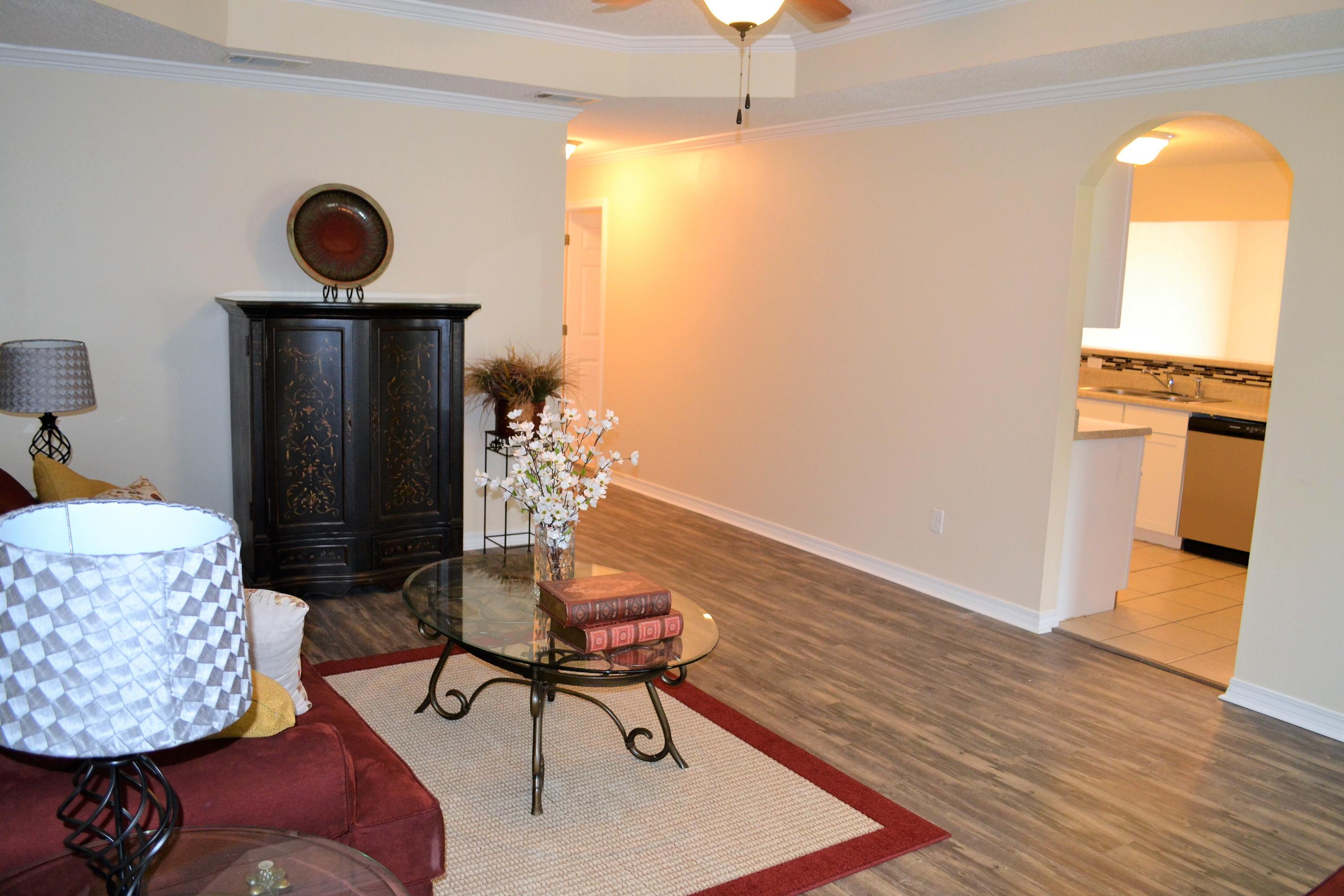 5237 Kervin Road Crestview, FL 32539 - Photo 4 of 28 a living room with furniture and wooden floor