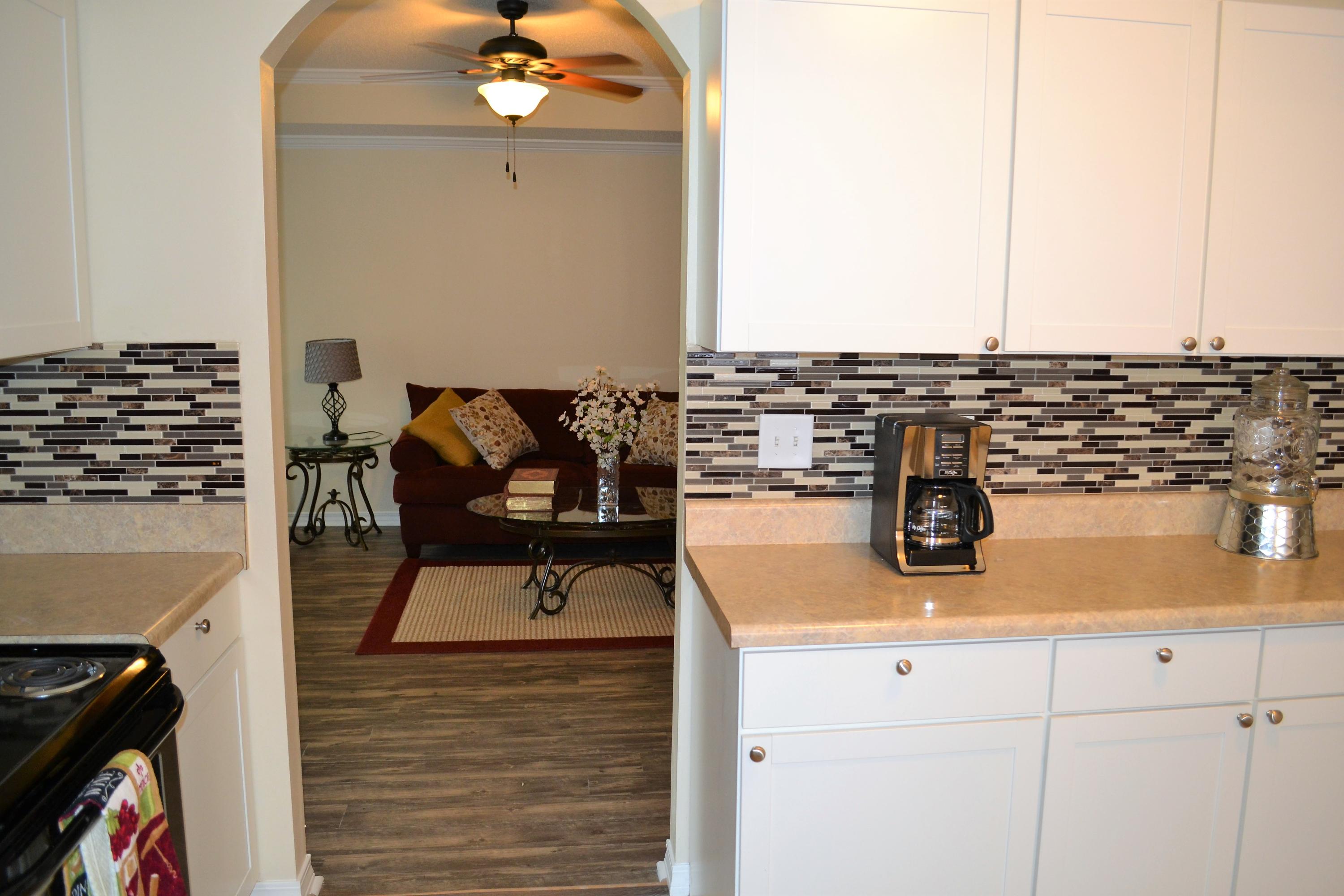 5237 Kervin Road Crestview, FL 32539 - Photo 5 of 28 a view of a workspace with kitchen countertops and stove