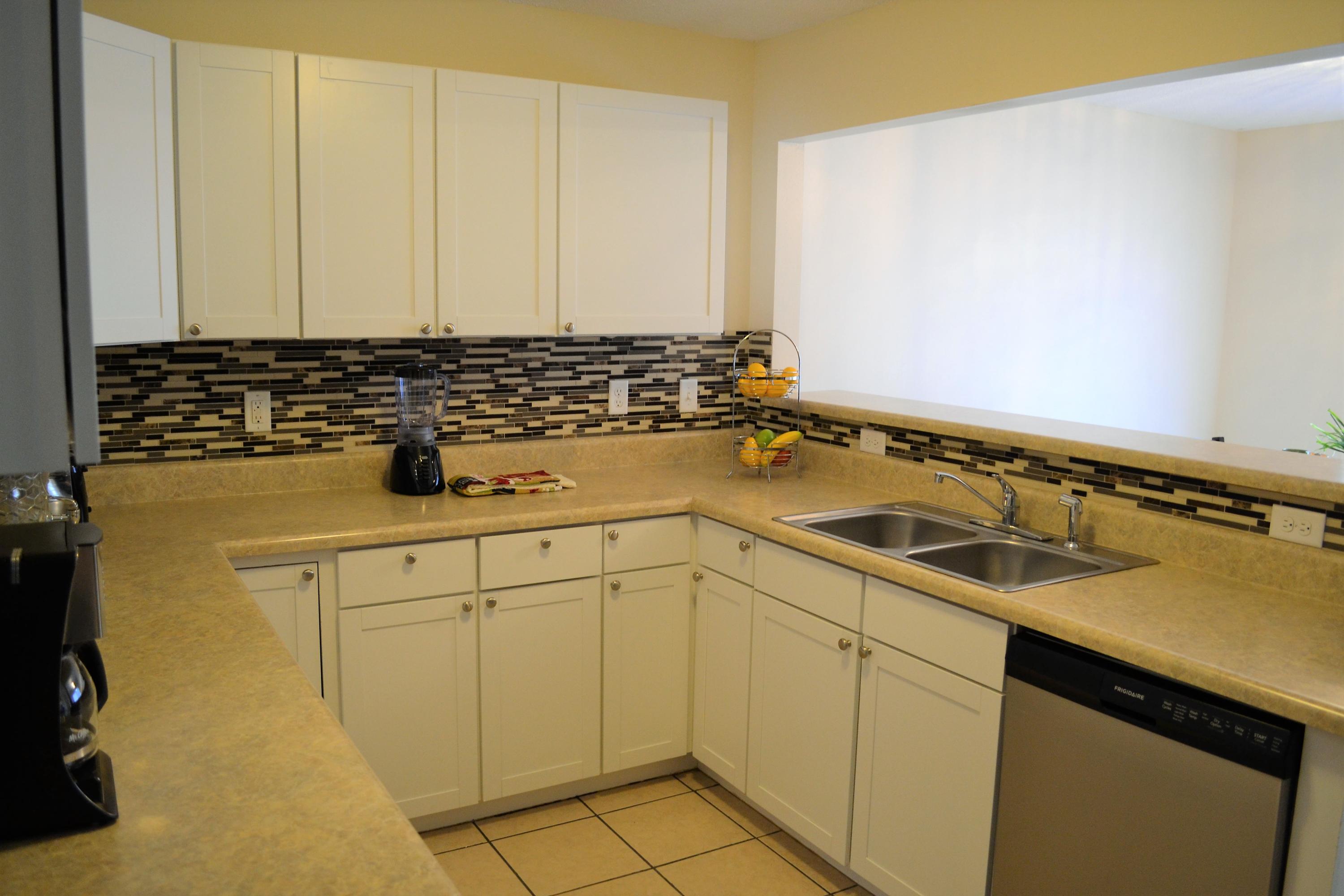 5237 Kervin Road Crestview, FL 32539 - Photo 7 of 28 a view of a sink and cabinets