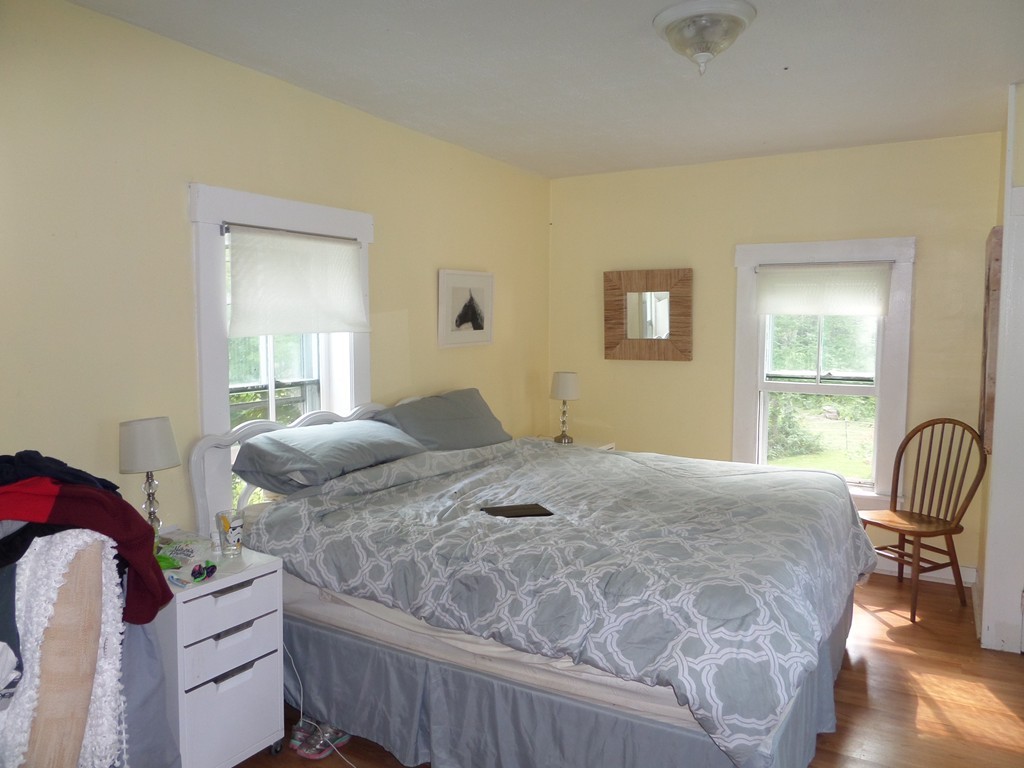 15 Bromley Road Huntington, MA 01050 - Photo 21 of 29 a bedroom with a bed and a window