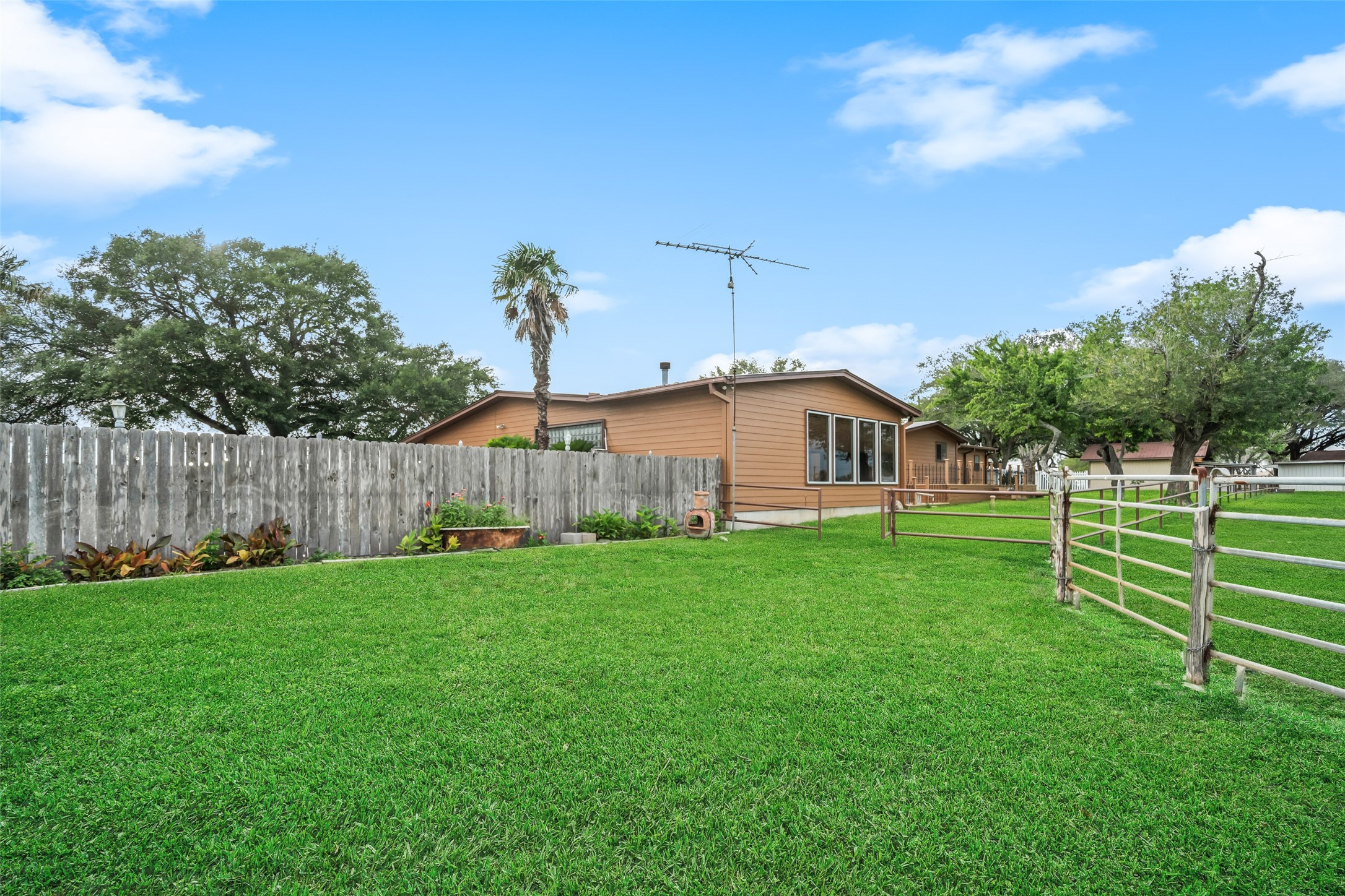 119 Fm 1891 Shiner, TX 77984 - Photo 14 of 40 a house view with a garden space