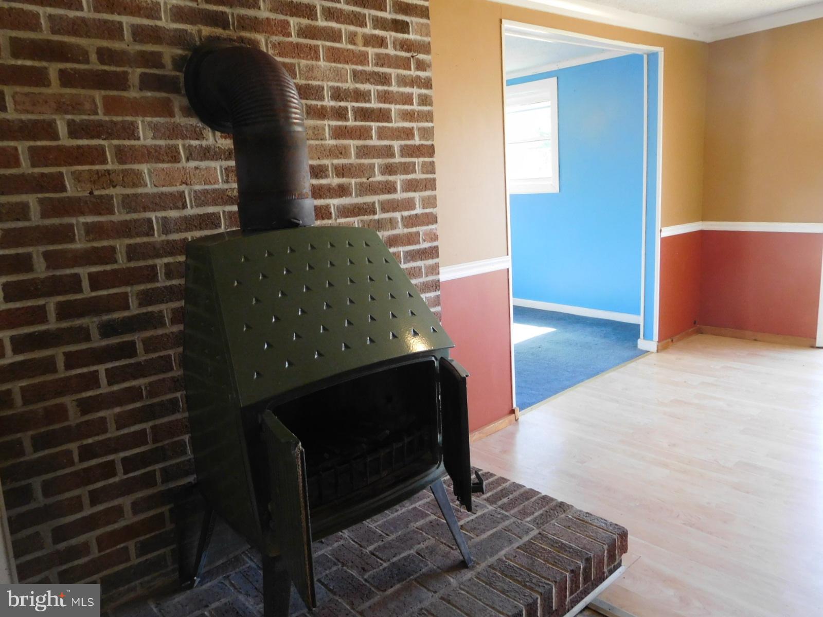 2201 Pondtown Road Chestertown, MD 21620 - Photo 2 of 9 a view of an empty room with wooden floor