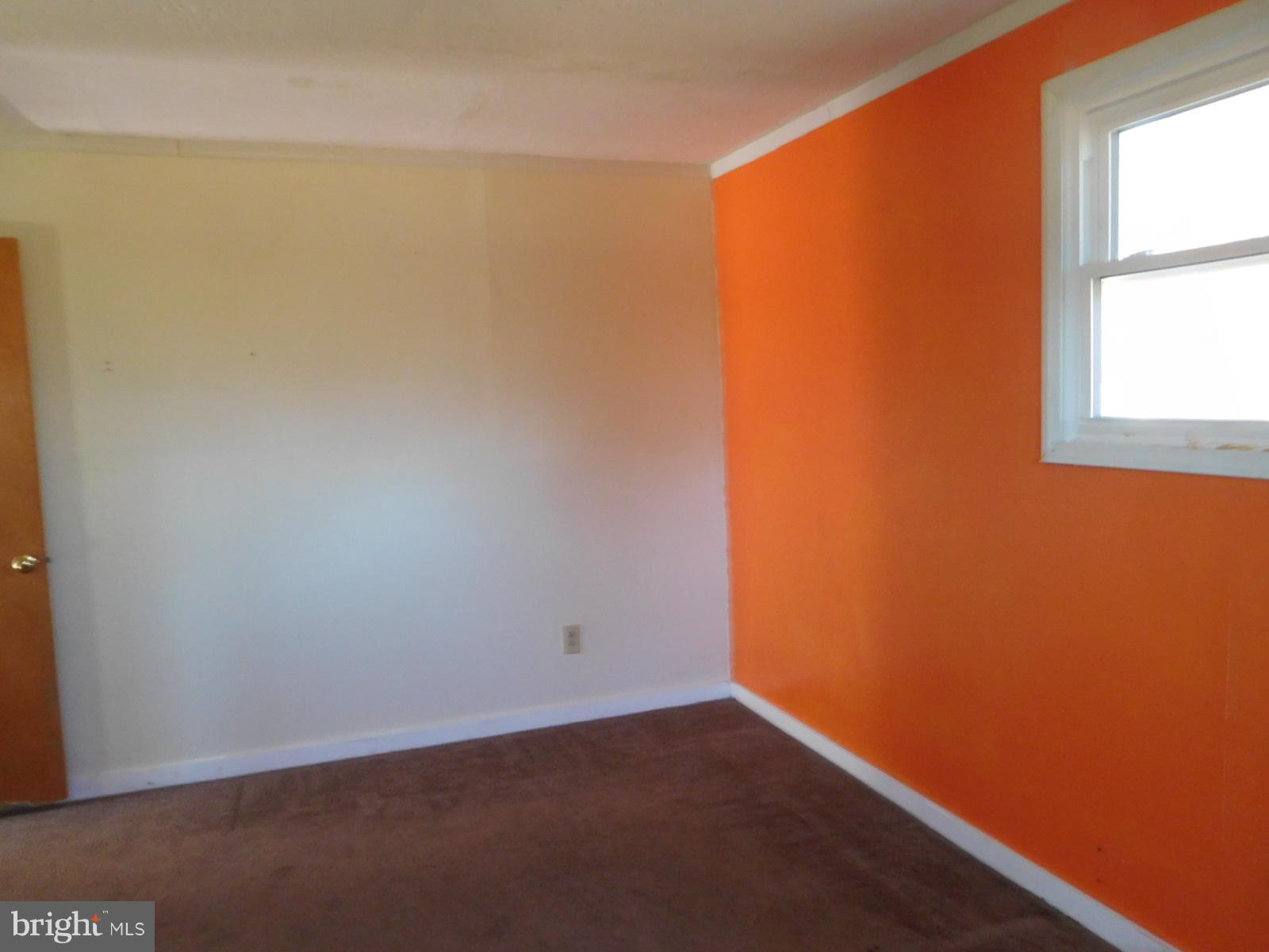 2201 Pondtown Road Chestertown, MD 21620 - Photo 8 of 9 an empty room with a window