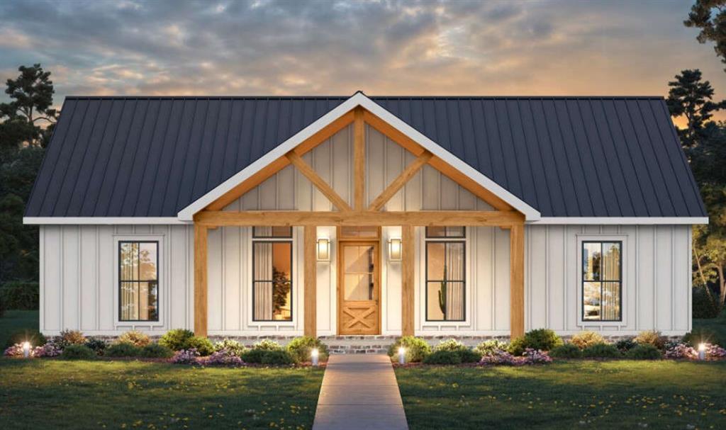 front view of a house with a yard