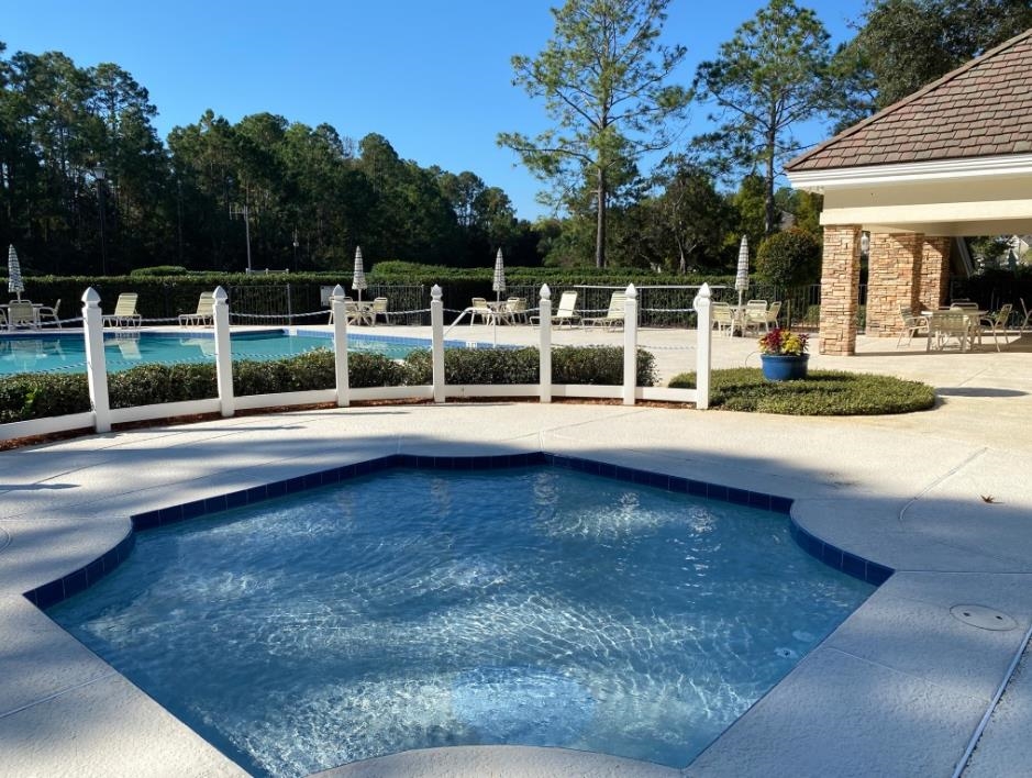 1132 Sandlake Road St. Augustine, FL 32092 - Photo 40 of 49 a view of a swimming pool with an outdoor space