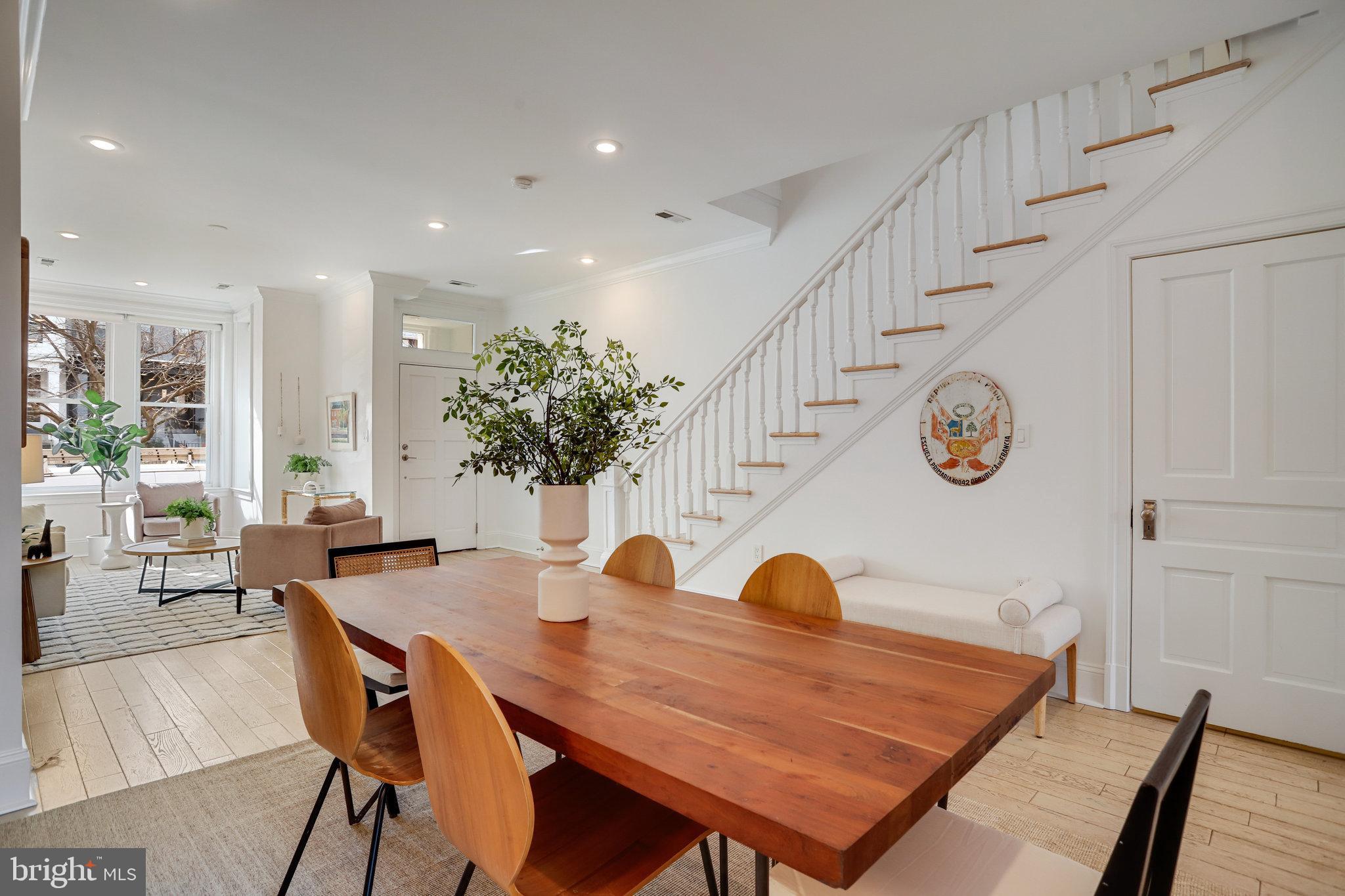 1322 E Street Northeast Washington, DC 20002 - Photo 11 of 49 a view of a dining room and hall with furniture