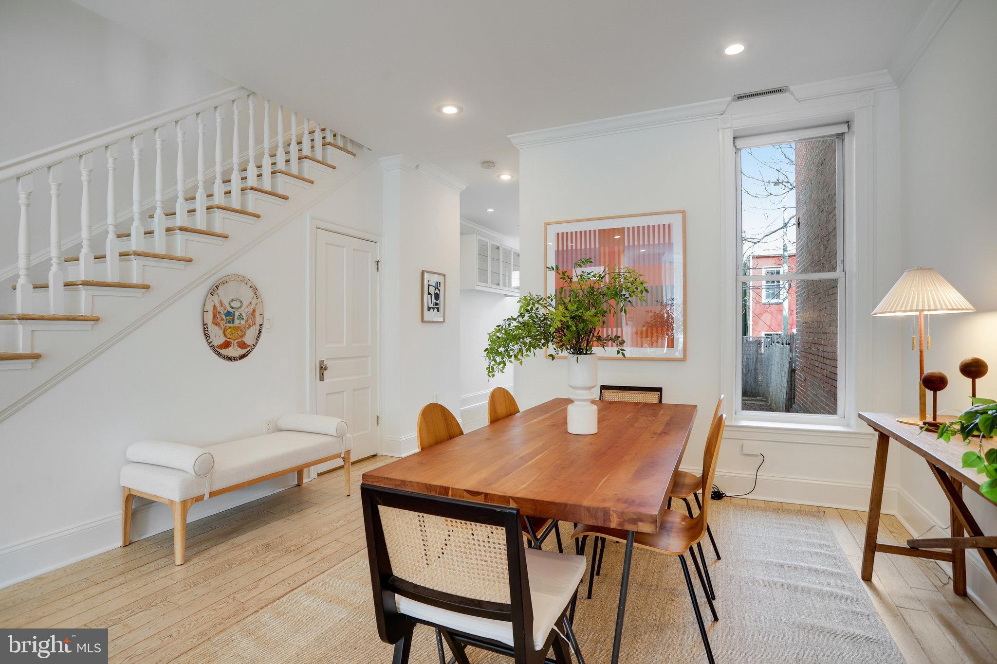 1322 E Street Northeast Washington, DC 20002 - Photo 9 of 49 a view of a dining room with furniture window and wooden floor