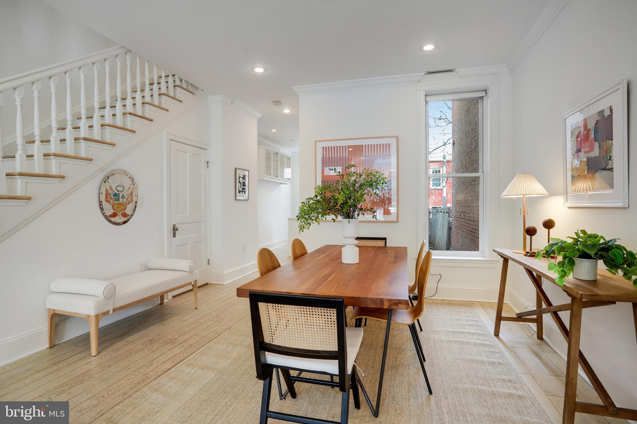 1322 E Street Northeast Washington, DC 20002 - Photo 10 of 49 a view of a dining room with furniture and chandelier