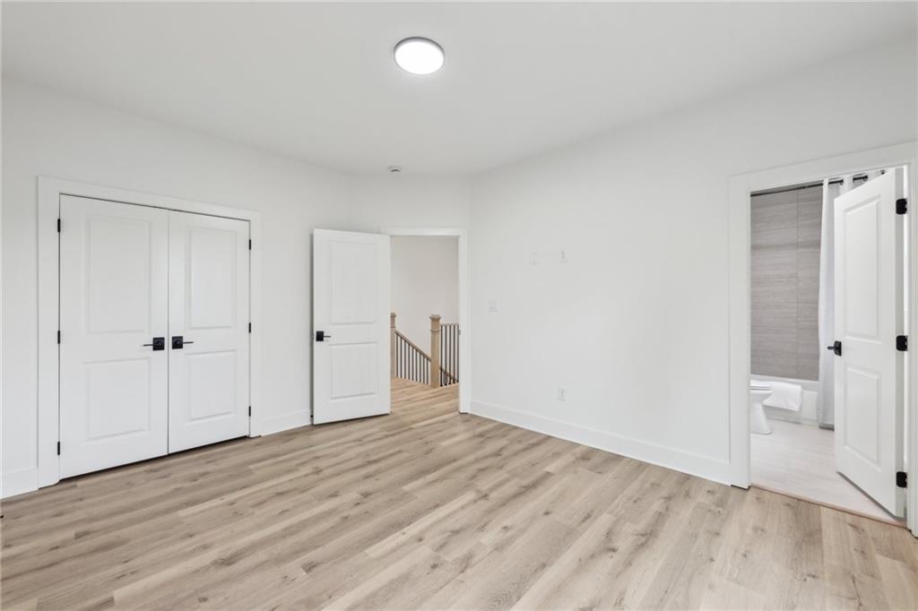 727 Garibaldi Street Southwest Atlanta, GA 30310 - Photo 36 of 84 a view of an empty room and wooden floor