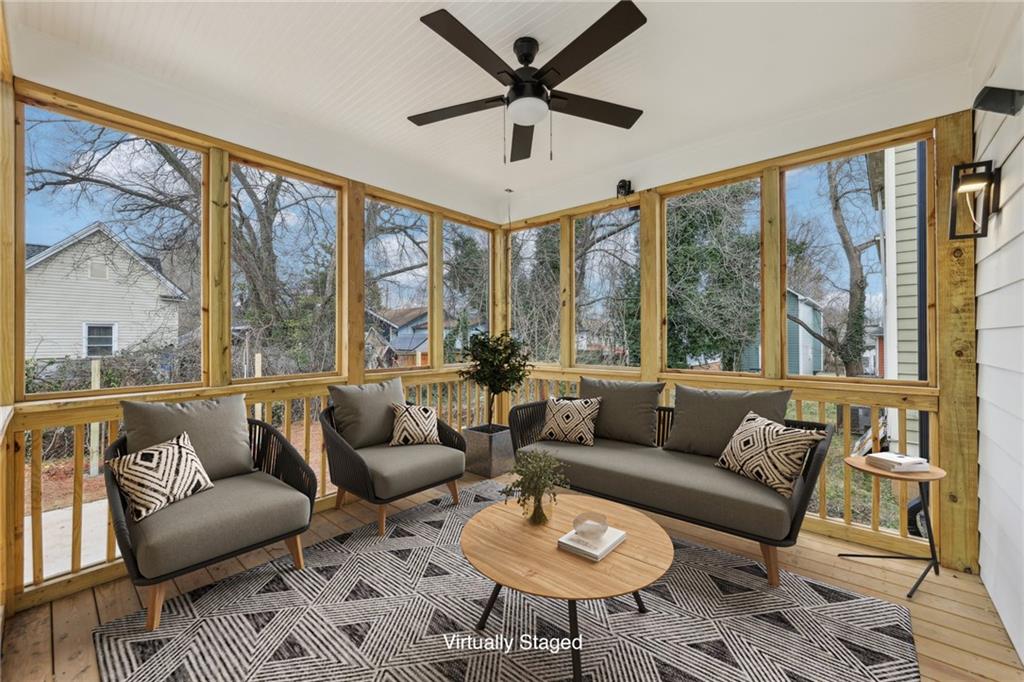 727 Garibaldi Street Southwest Atlanta, GA 30310 - Photo 48 of 84 a living room with furniture and a large window