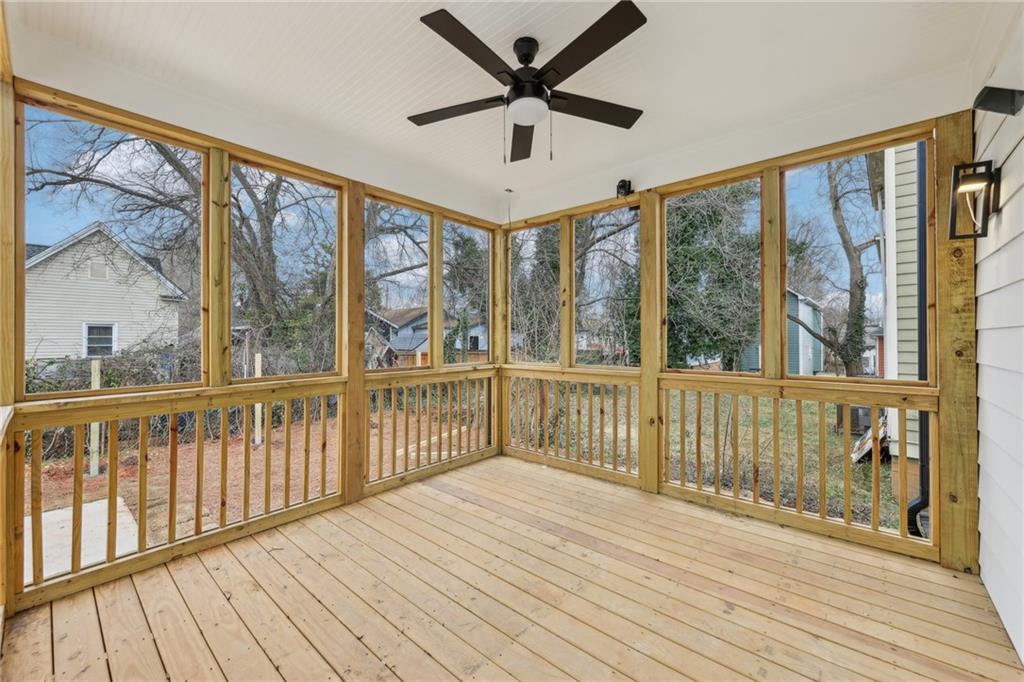 727 Garibaldi Street Southwest Atlanta, GA 30310 - Photo 49 of 84 a view of a porch with wooden floor