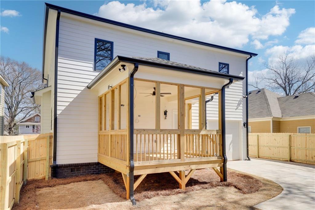 727 Garibaldi Street Southwest Atlanta, GA 30310 - Photo 55 of 84 a view of a house with a wooden deck