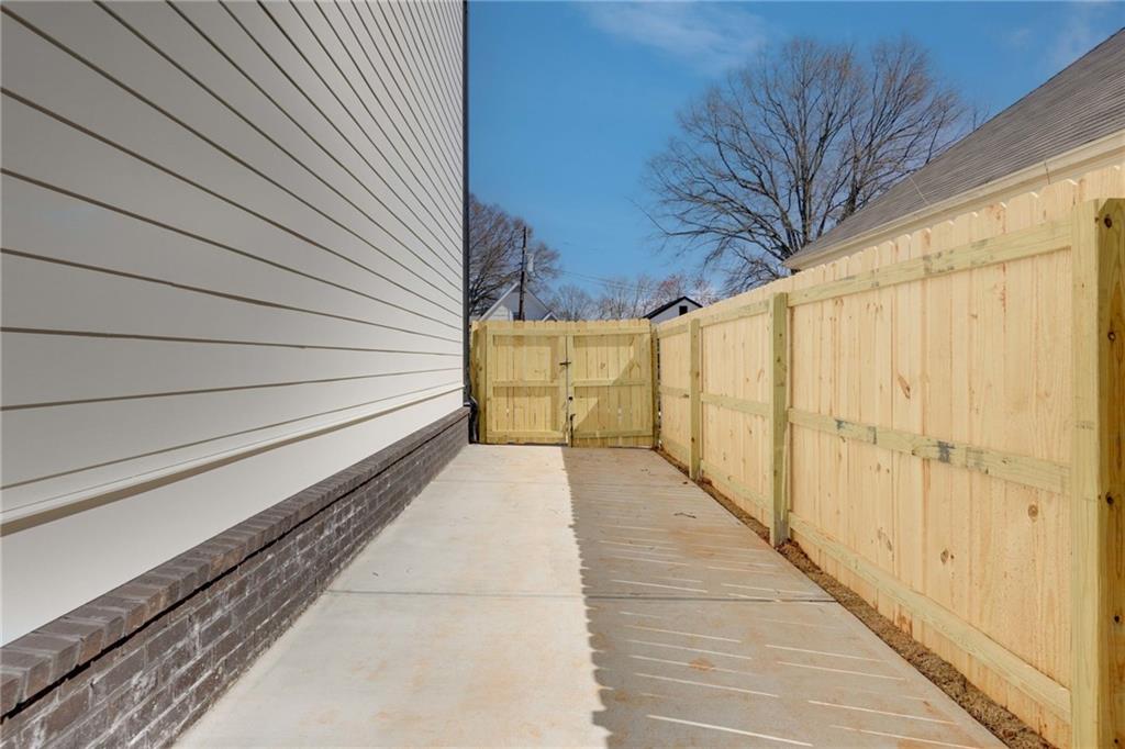 727 Garibaldi Street Southwest Atlanta, GA 30310 - Photo 58 of 84 a view of a pathway with a buildings