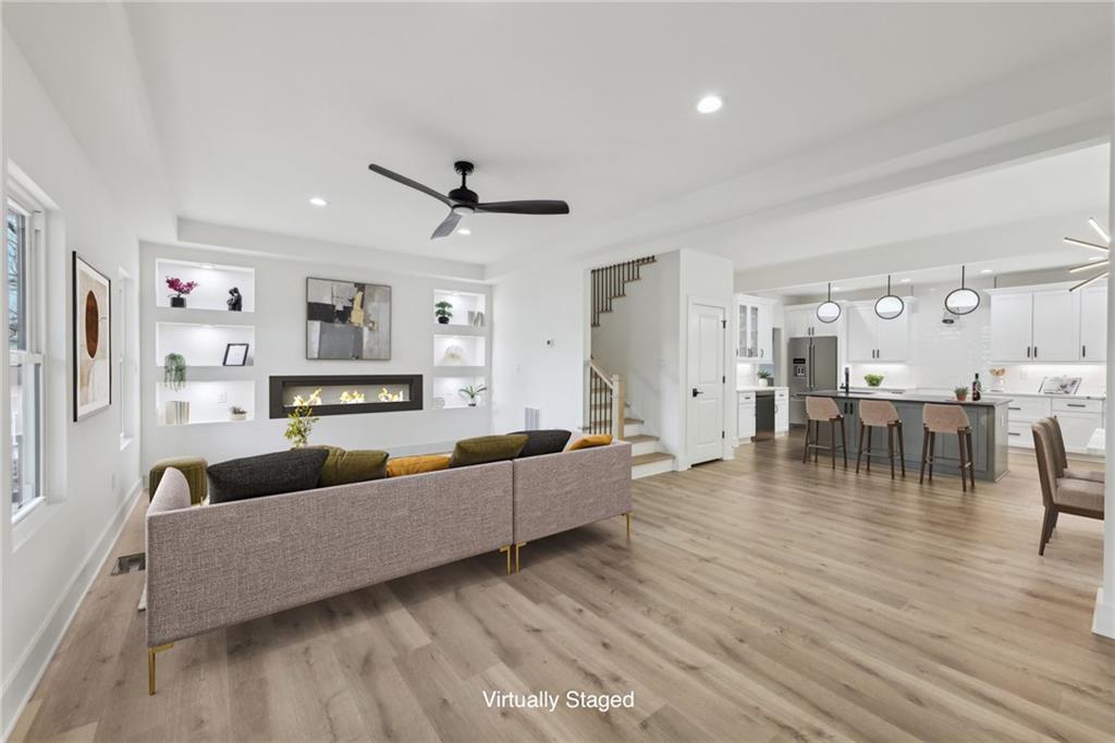 727 Garibaldi Street Southwest Atlanta, GA 30310 - Photo 6 of 84 a living room with furniture and a wooden floor
