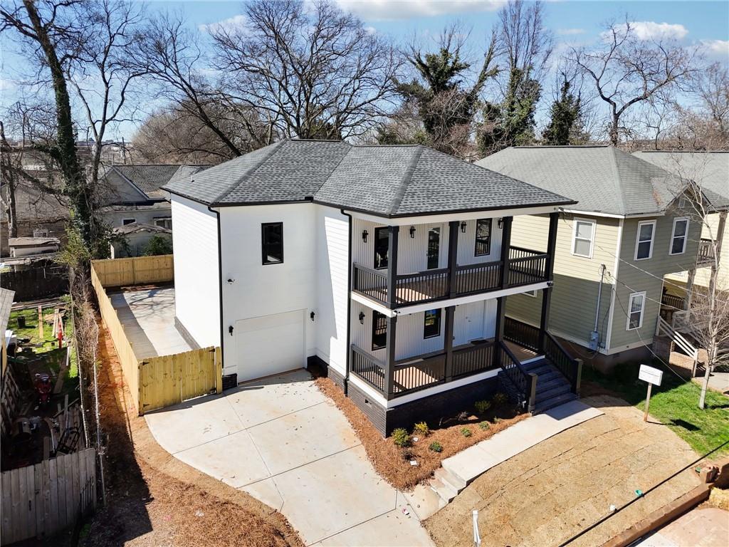 727 Garibaldi Street Southwest Atlanta, GA 30310 - Photo 75 of 84 a view of a house with wooden deck front of house
