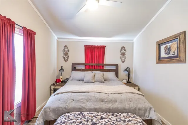 a bedroom with a large bed and a closet