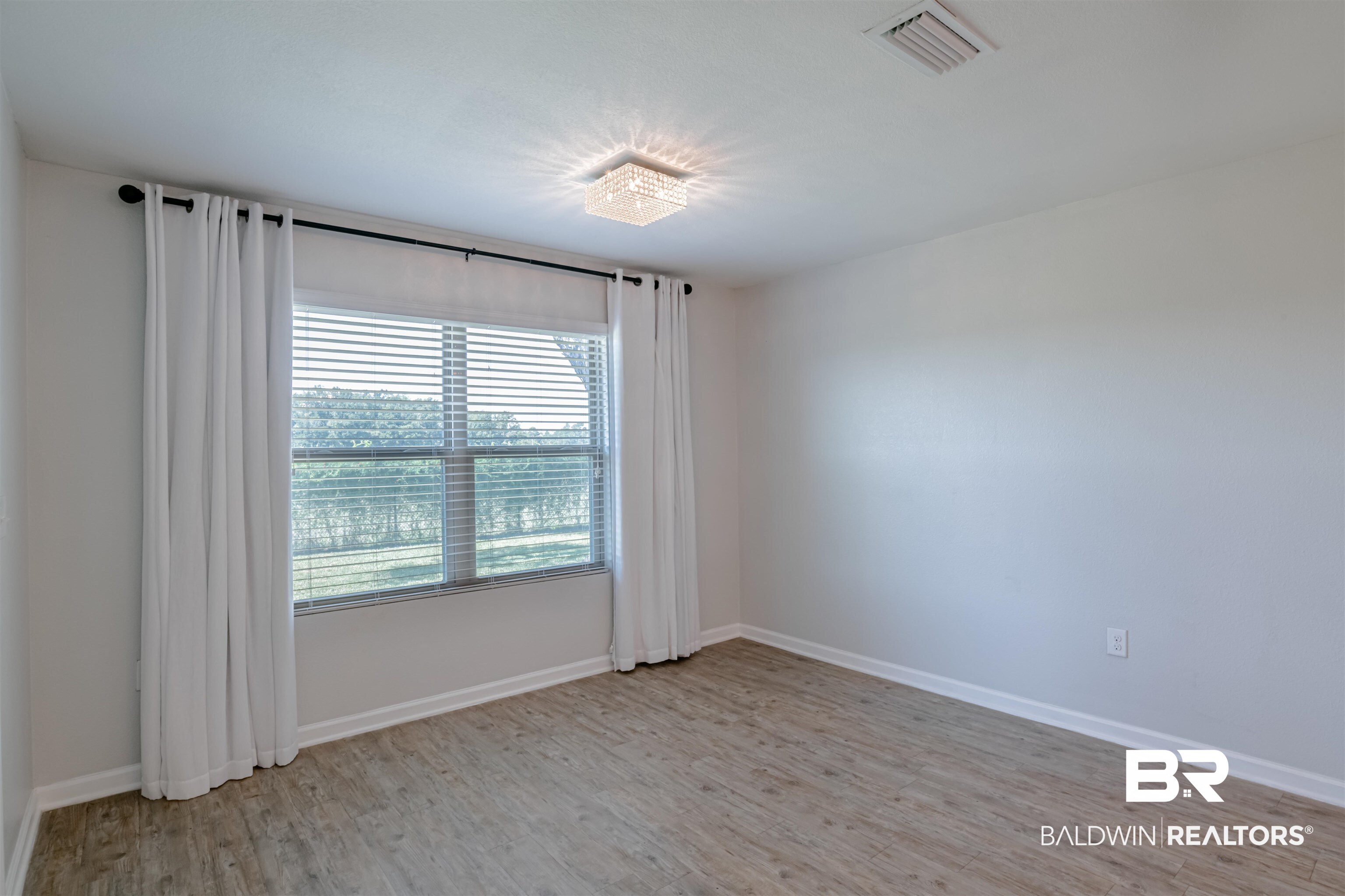 1664 Abbey Loop Foley, AL 36535 - Photo 15 of 31 Dining Area Overlooks Backyard