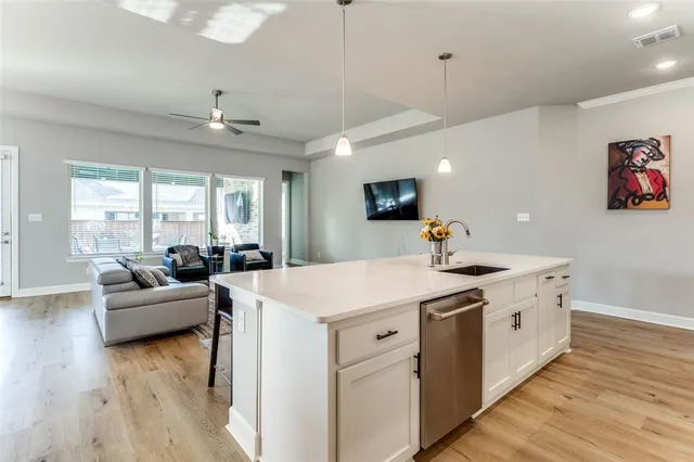 a view of living room with furniture and flat screen tv
