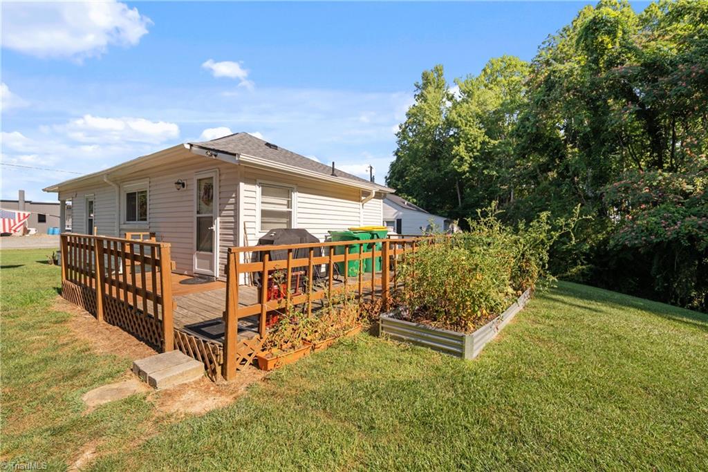208 Carson Road Pilot Mountain, NC 27041 - Photo 29 of 45 back deck with raised garden