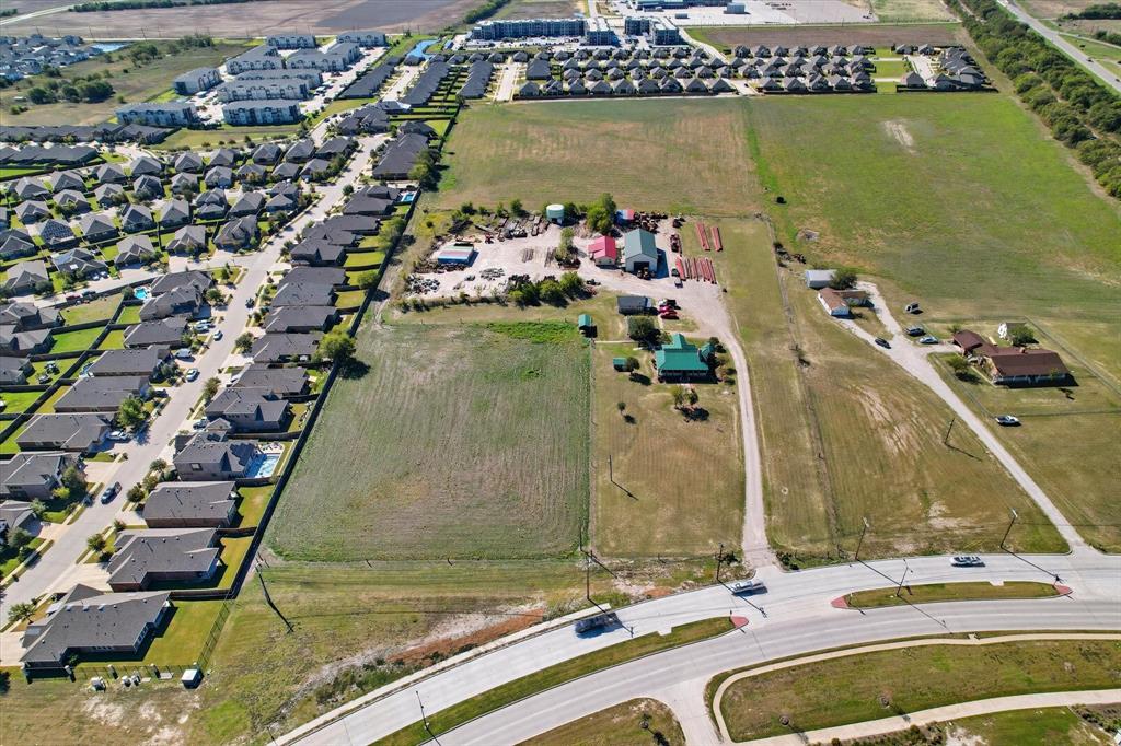 301 East Finley Boulevard Anna, TX 75409 - Photo 3 of 12 an aerial view of a residential building with outdoor space