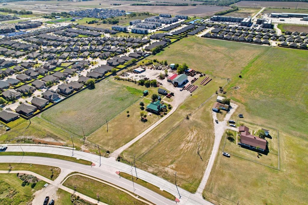 301 East Finley Boulevard Anna, TX 75409 - Photo 4 of 12 an aerial view of residential houses with outdoor space