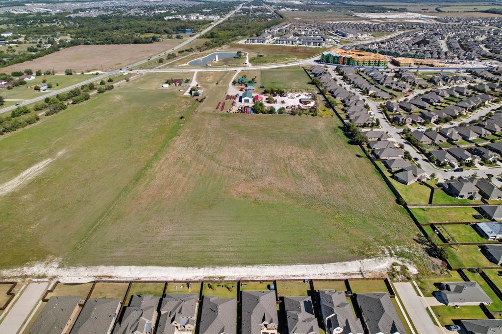 301 East Finley Boulevard Anna, TX 75409 - Photo 7 of 12 an aerial view of residential houses with outdoor space
