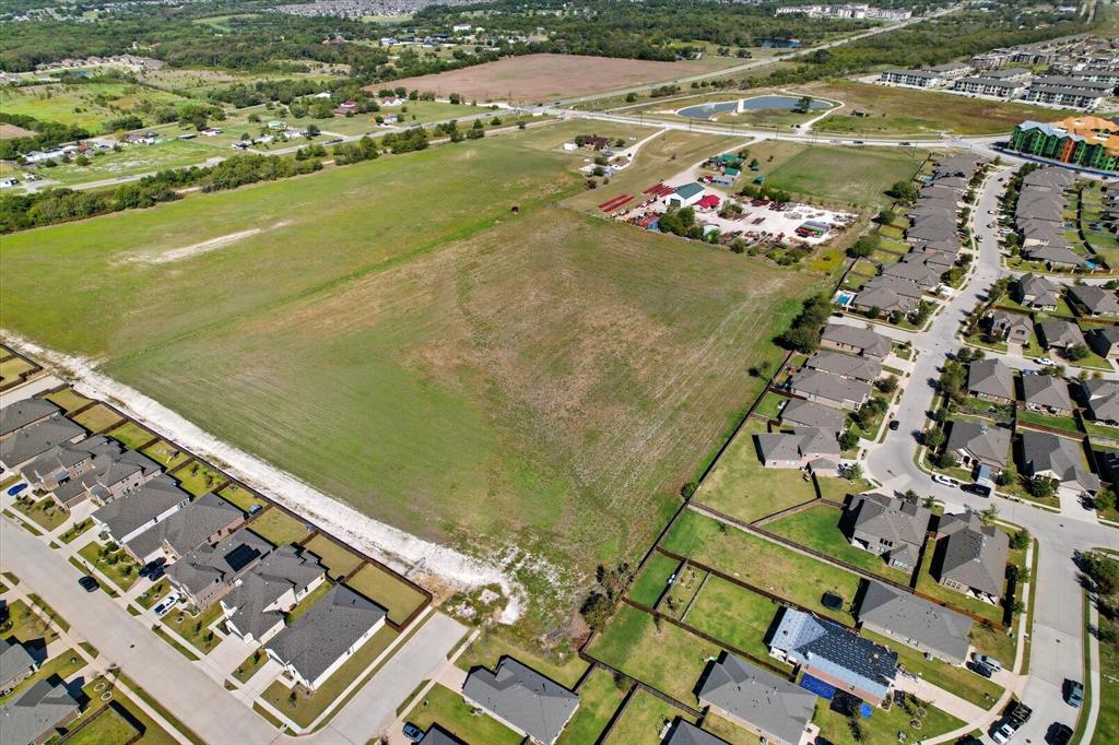 301 East Finley Boulevard Anna, TX 75409 - Photo 8 of 12 an aerial view of residential houses with outdoor space