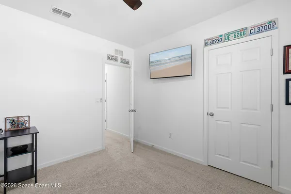 a view of a swimming pool with a yard