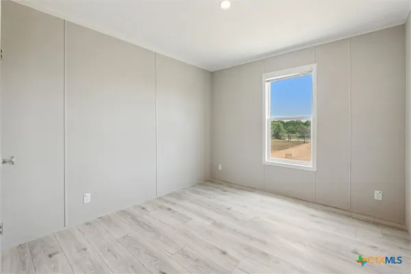 an empty room with a window