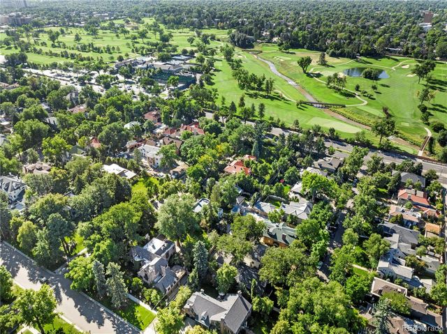 a view of a large yard with green space