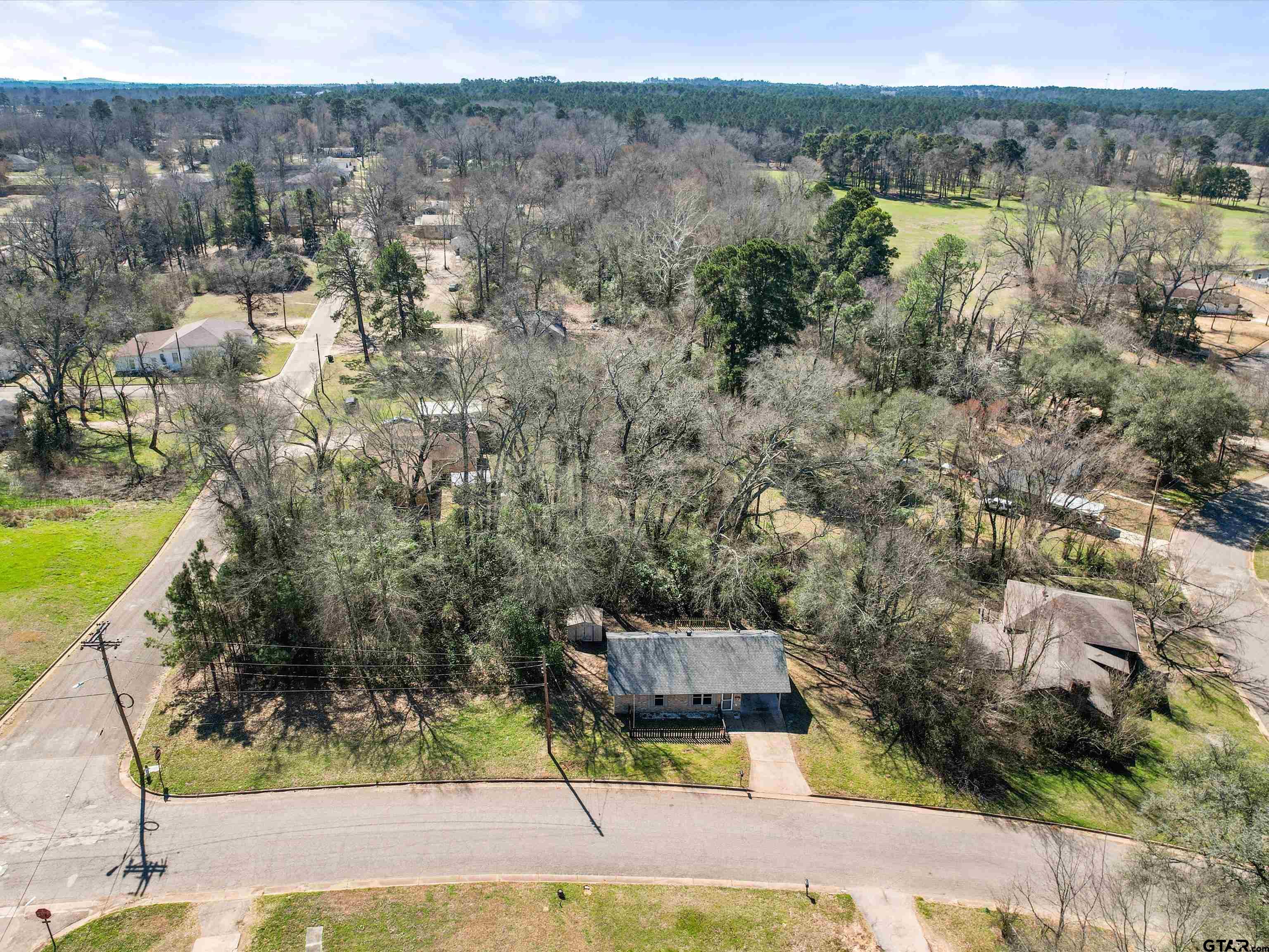 901 Skyview Drive Gilmer, TX 75644 - Photo 5 of 18 a aerial view of a house with a yard