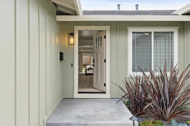 a view of front door with a glass door