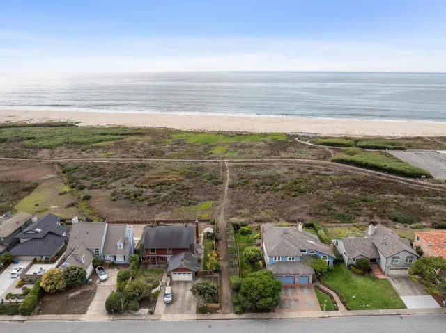 a view of a city with an ocean