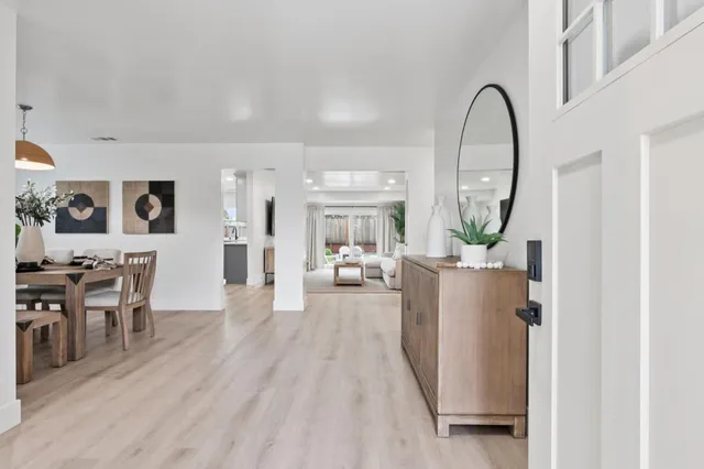 a view of a living room and dining room
