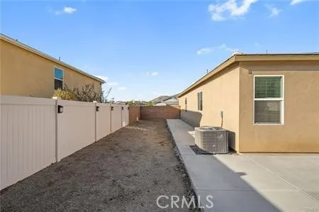 a view of a back yard of the house
