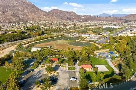 an aerial view of residential houses with outdoor space