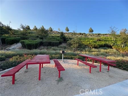 20565 Lost Creek Road Riverside, CA 92507 - Photo 30 of 32 a park view with a bench and a bench in the patio