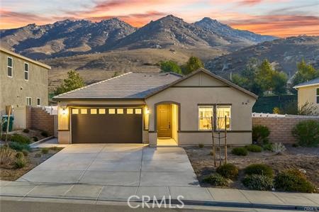 20565 Lost Creek Road Riverside, CA 92507 - Photo 32 of 32 a front view of a house with a yard and garage