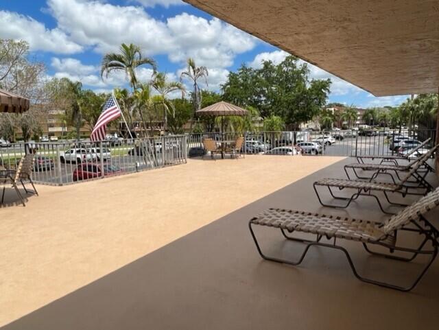 9300 Southwest 8th Street, Unit 408 Boca Raton, FL 33428 - Photo 17 of 18 17-Outdoor sitting area on 2nd floor